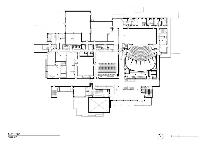 First floor plan drawing showing upper level with terraced seating in rounded theater volume