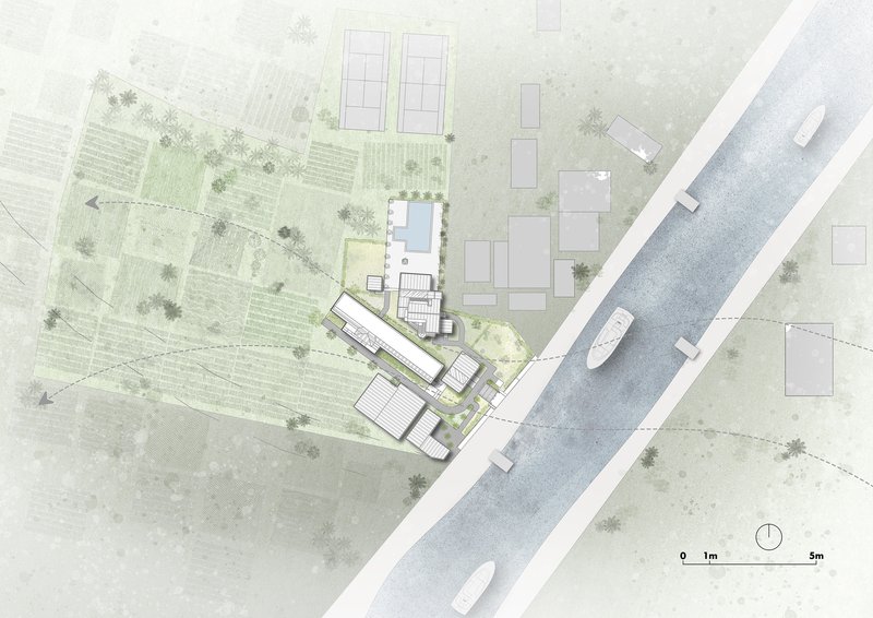 Site plan drawing showing an angled building cluster adjacent to a waterway with boats and surrounding landscape