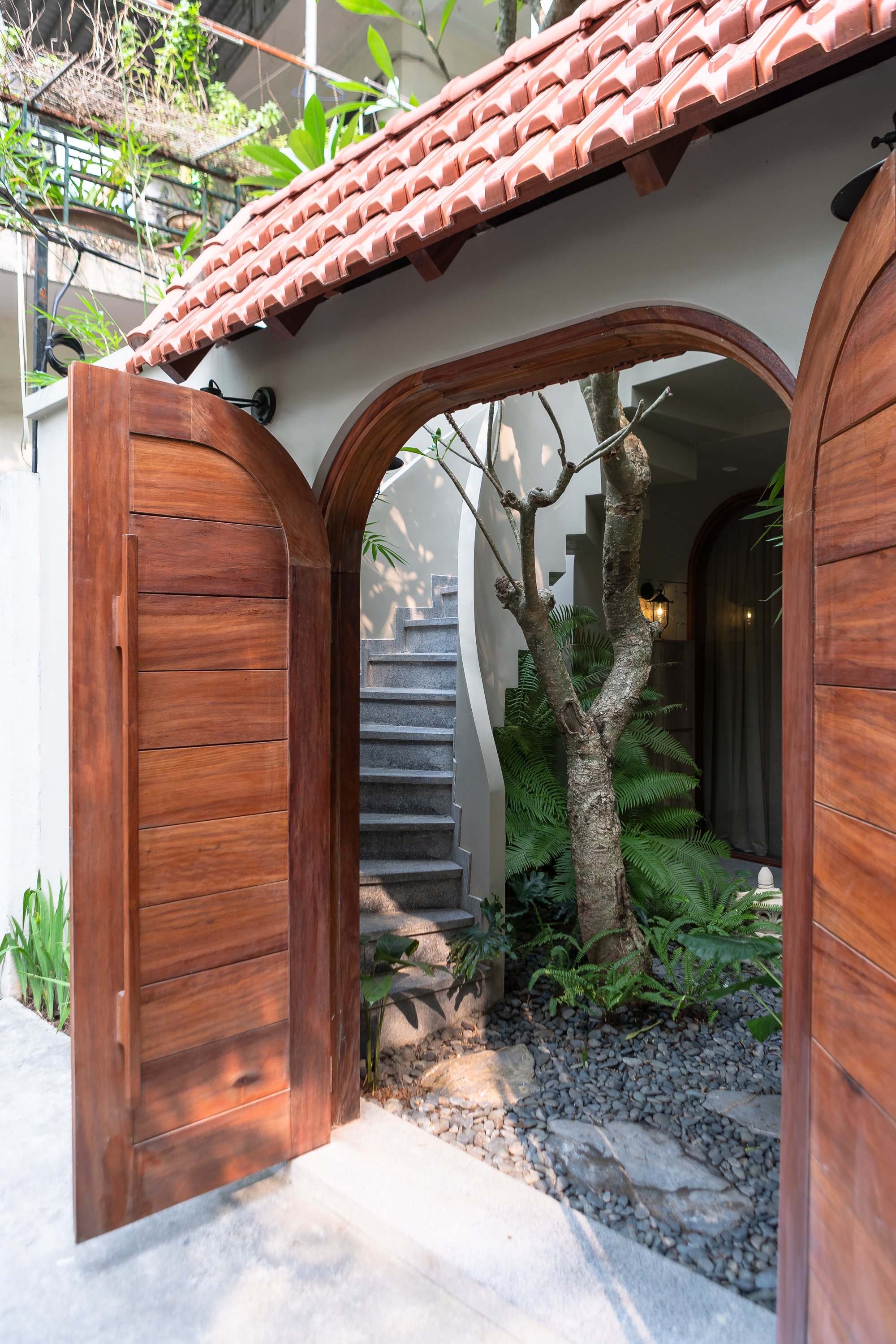 Nguyen Khac Phuoc Architects Carve Light and Air into a Dark Hanoi Row House