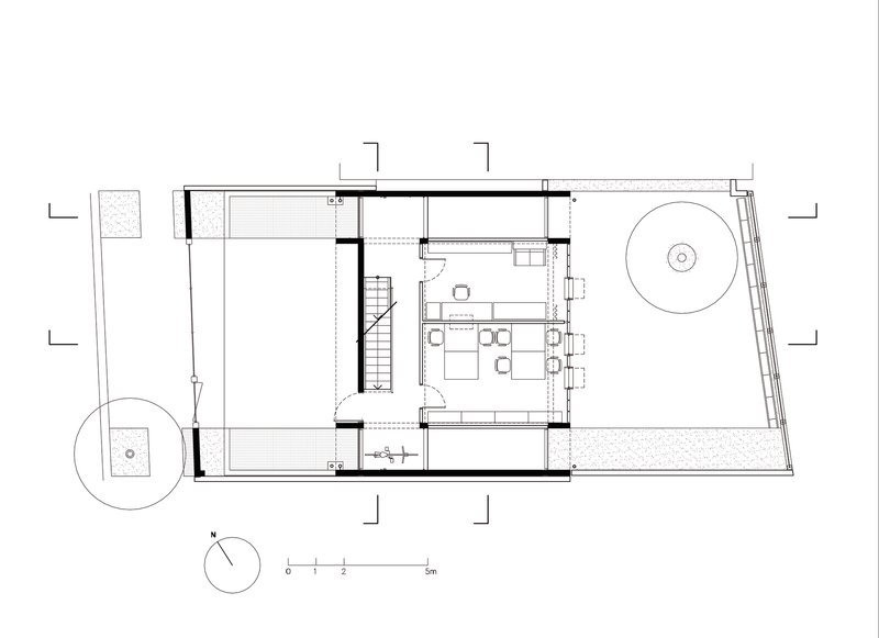 First floor plan showing open living and dining area with exterior terrace and circular pool