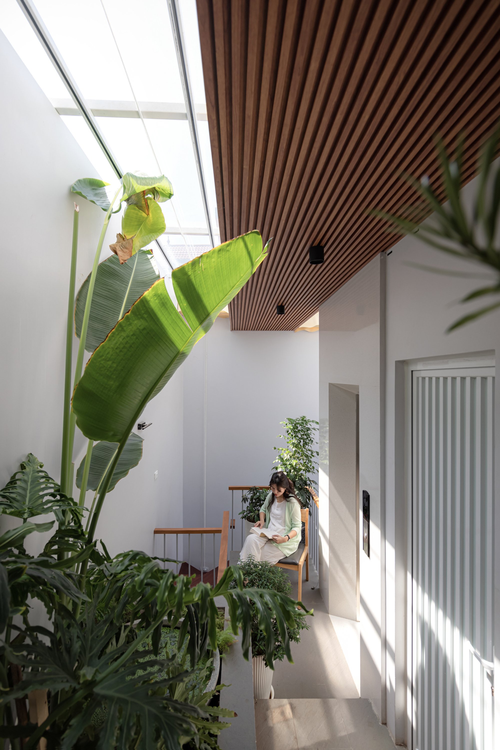 A4 Architects Stacks Five Generations of Living into a 3.6-Meter-Wide Hanoi Tube House