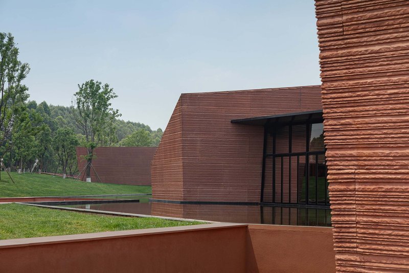 Line, Studio, and GAD Scatter Five Stone Volumes Across a Yunnan Hilltop to Form a Cultural Center