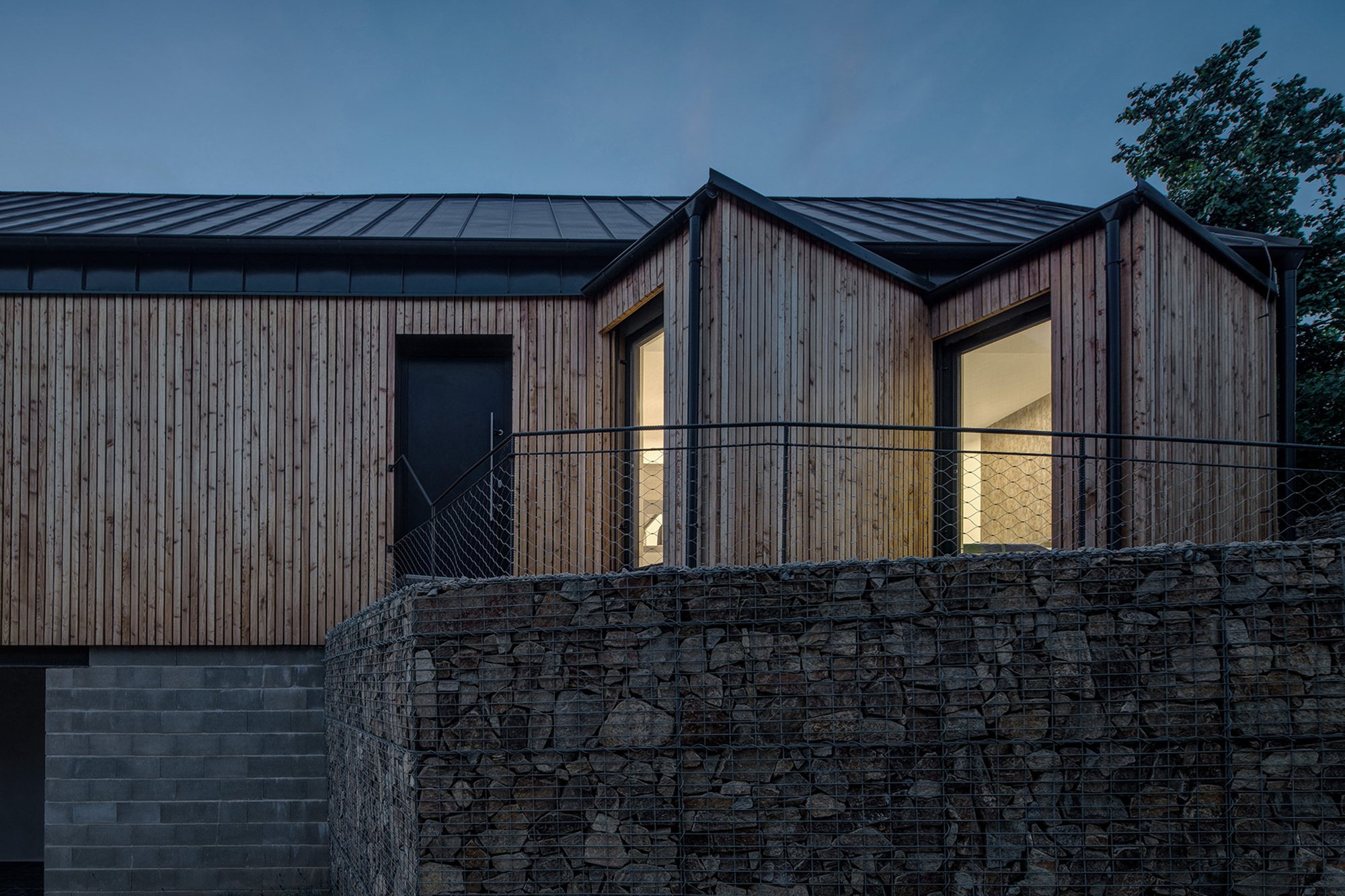 boq architekti Fits a Gabled Family House onto a Tiny Moravian Hillside Plot with No Room for a Garden
