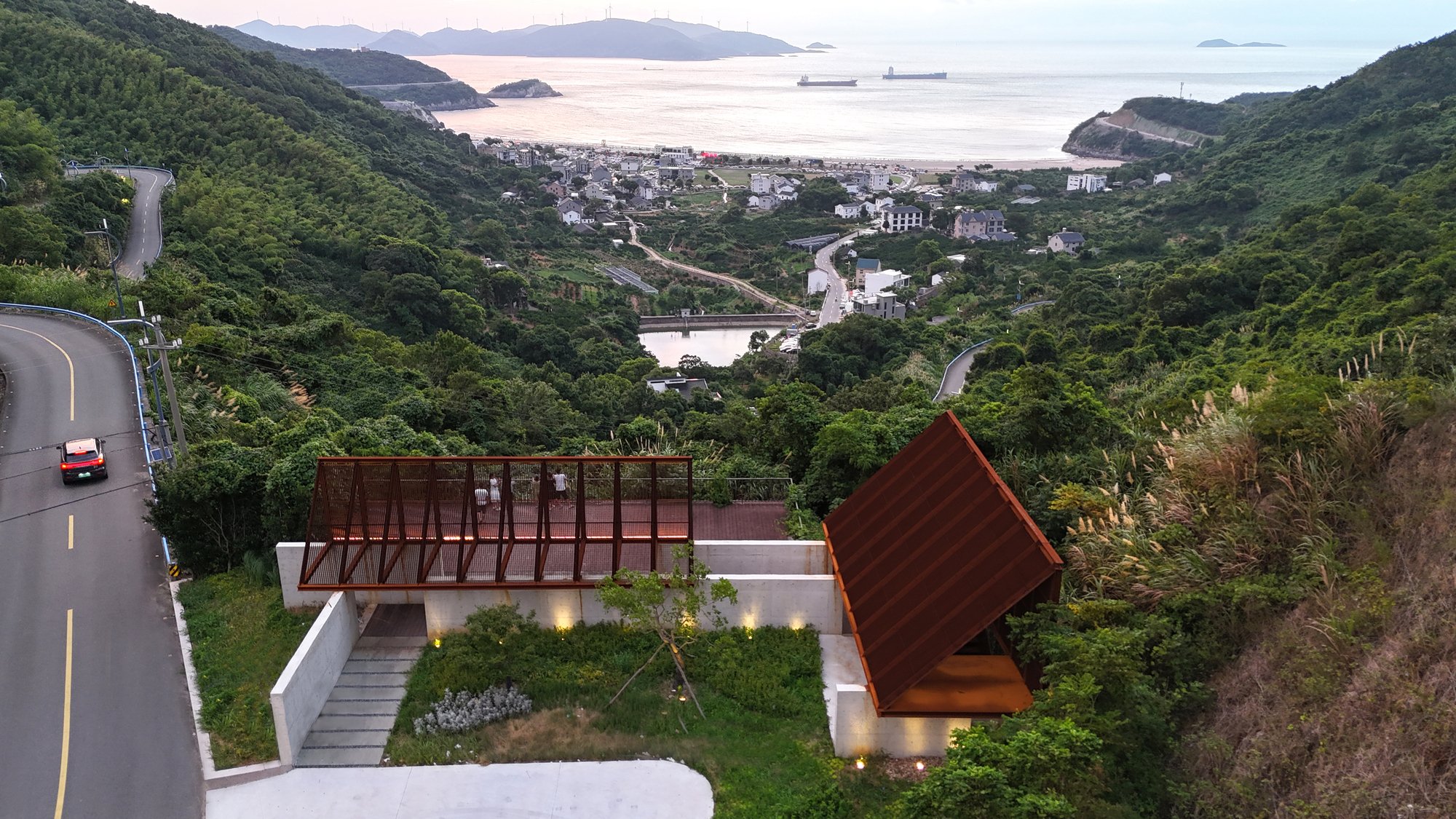 Atelier LuxNox and Found Projects Split a Gable Roof in Two to Frame the Ningbo Coast