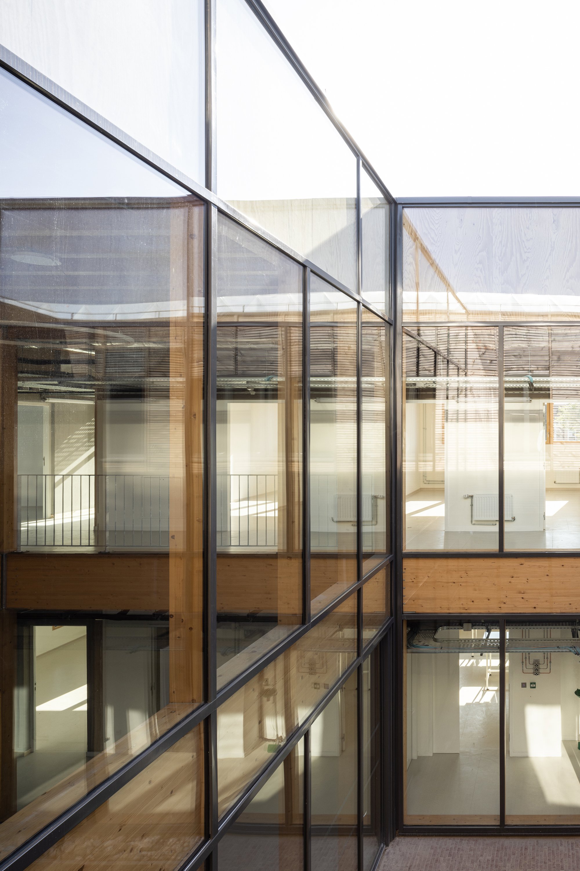 Atelier Téqui Architects Builds a Frugal Timber Research Center on a Former Livestock Market in Arras