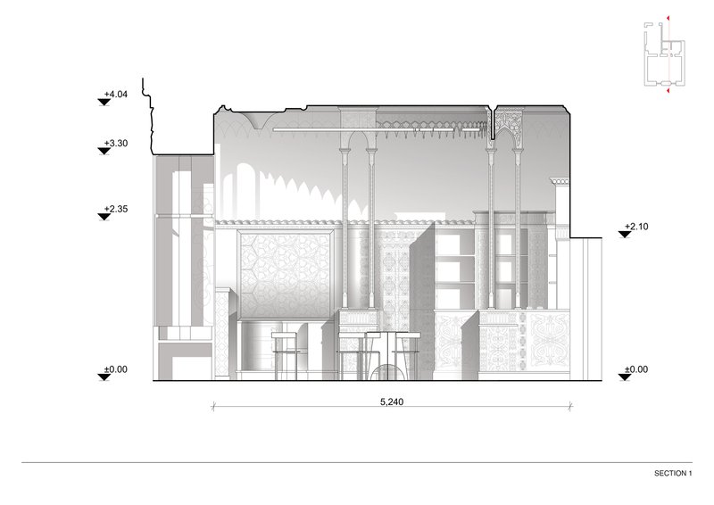 Section drawing showing double-height space with patterned screens, columns, and seating at bar height