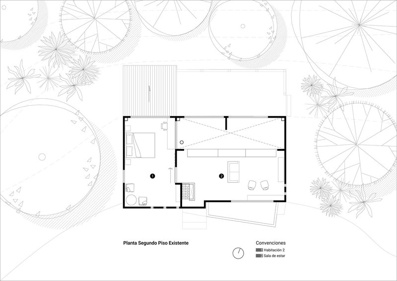 Second floor plan drawing showing bedroom and living room with sloped roof indicated by dashed lines