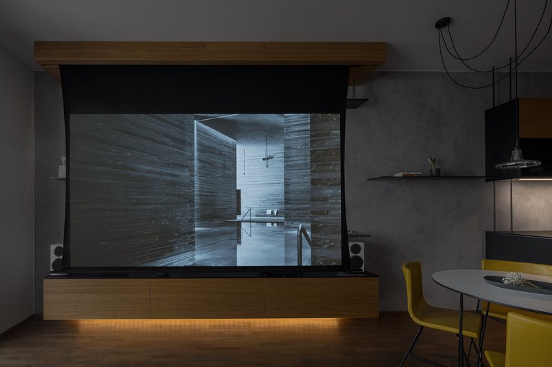 Hidden projection screen creates a seamless cinema-like experience