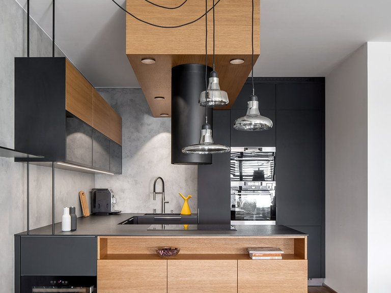Modern Minimalist Apartment Interior Design: A Black Kitchen Concept in Prague
