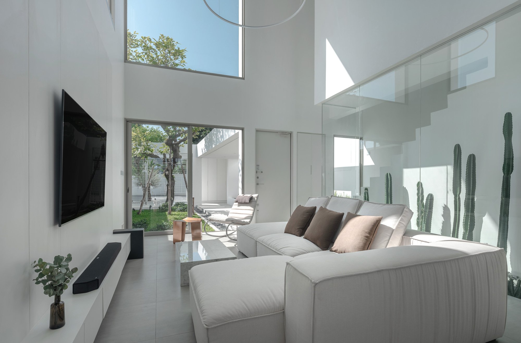 Blankstudio Threads Light and Landscape Through a 10-Meter-Wide House in Chiang Mai
