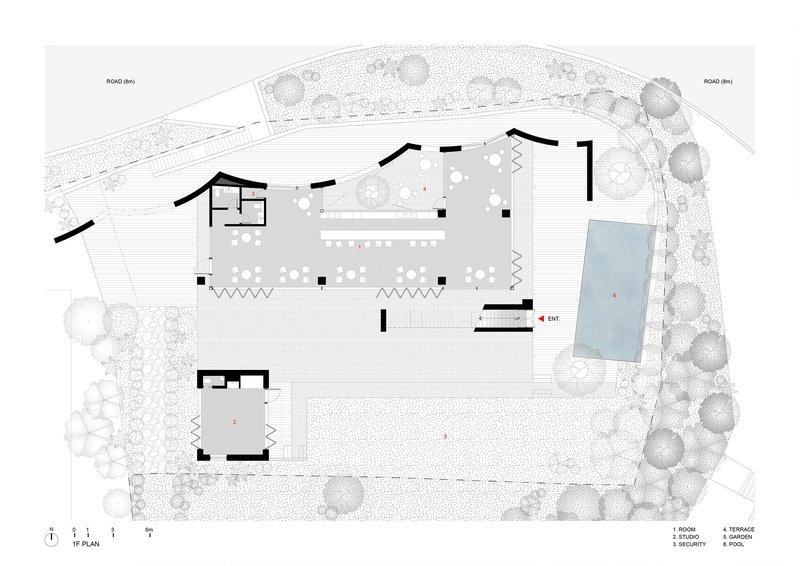 Ground floor plan drawing showing a linear building with terraced seating area and swimming pool