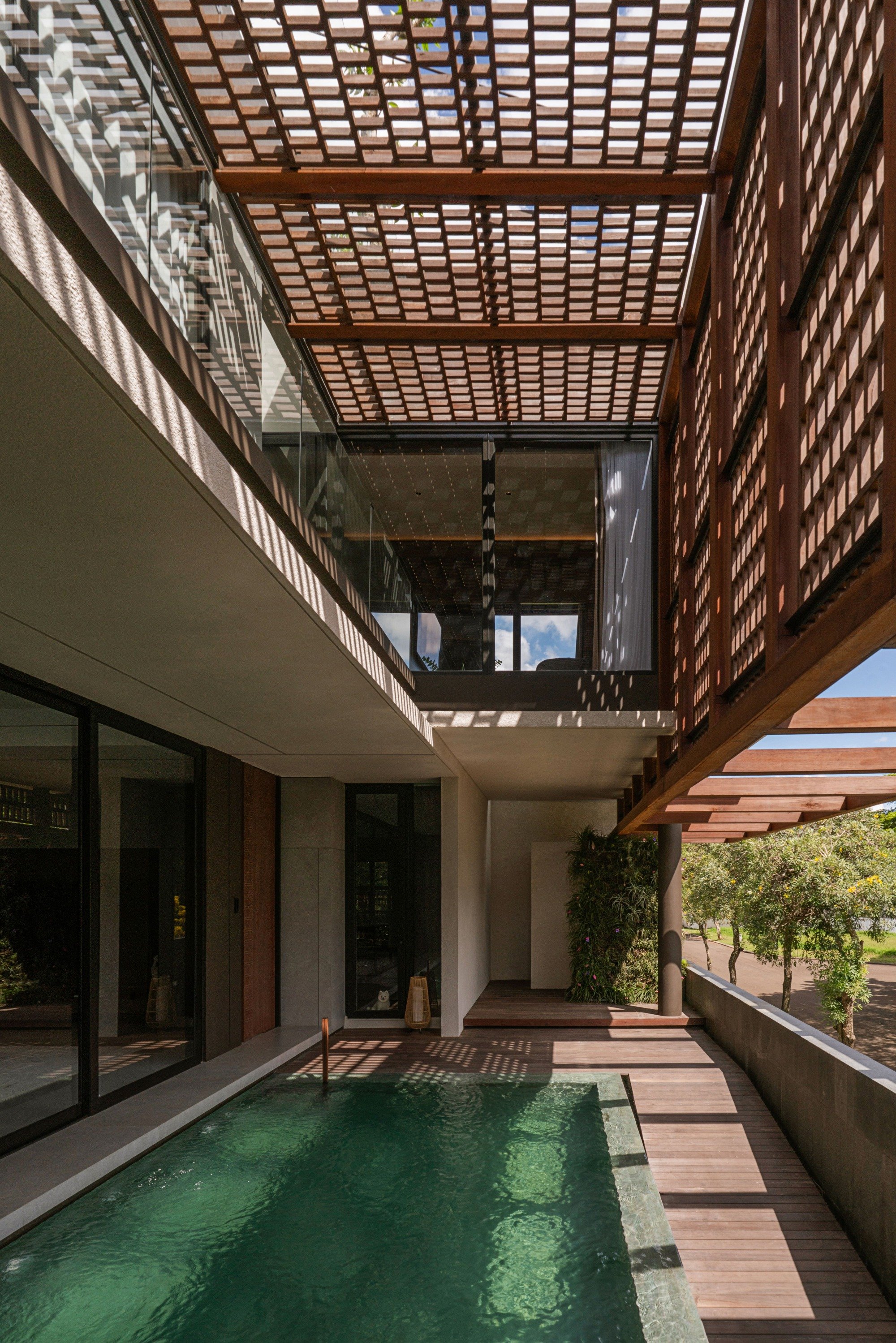 studiokian Wraps a Jakarta House in Terracotta Lattice to Build a Tropical Sanctuary