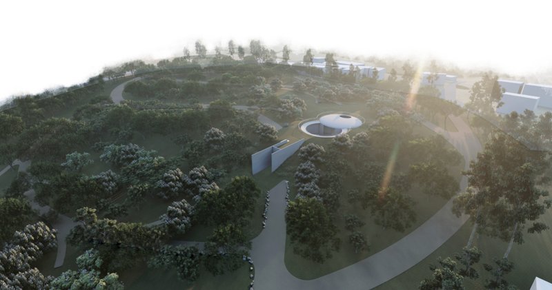 The chapel emerges subtly within a regenerated forest, where architecture and ecology operate as one system.