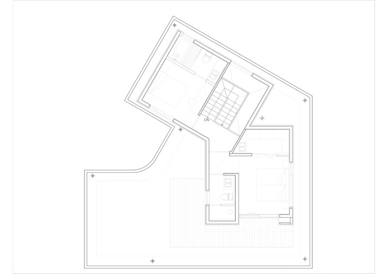 Floor plan drawing showing irregular geometry with curved exterior wall and central service core