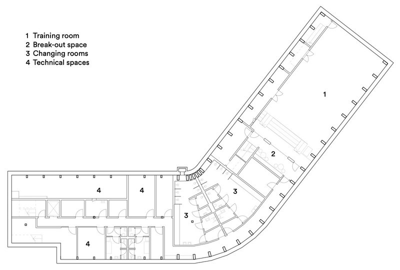 Floor plan drawing showing angled wings with training room, breakout space, changing rooms, and technical spaces