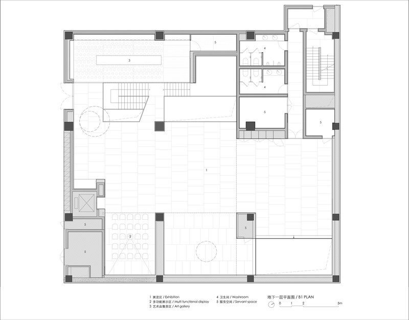 First floor plan drawing showing an open layout with exhibition space, staircase, and service rooms