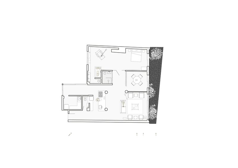 Floor plan drawing showing an L-shaped apartment with living area, bathroom, bedroom and planted terrace
