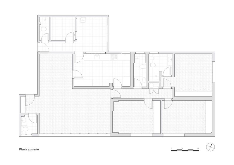 Existing floor plan drawing showing the original apartment layout with compartmentalized rooms and circulation paths