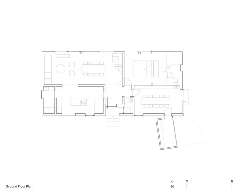 Ground floor plan drawing showing living and dining spaces with an angled extension