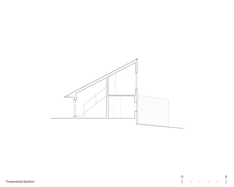 Transversal section drawing showing the sloped roof profile and interior staircase with adjacent volume