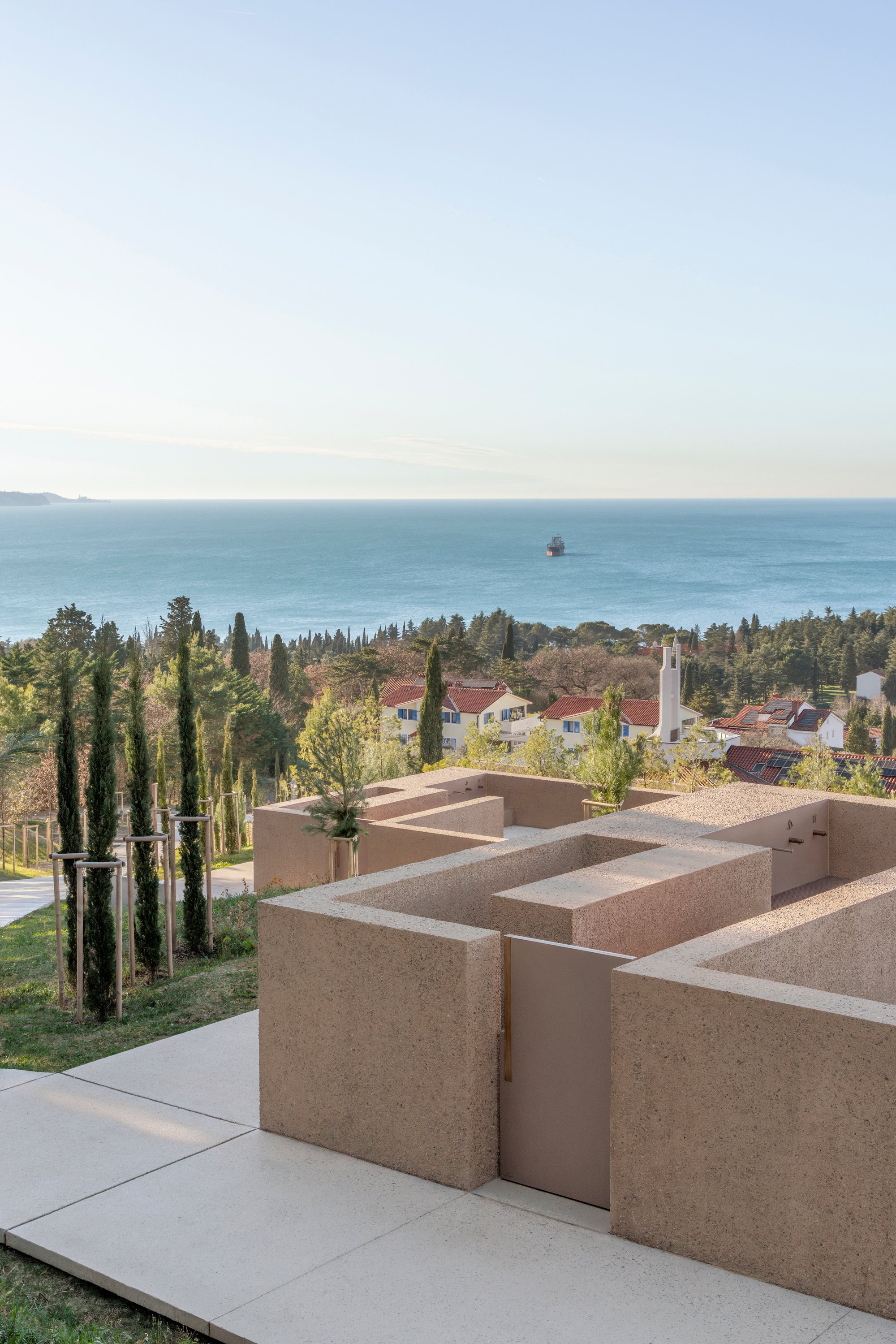 void arhitektura Terraces a Slovenian Cemetery into a Forest Ridge Above the Bay of Trieste