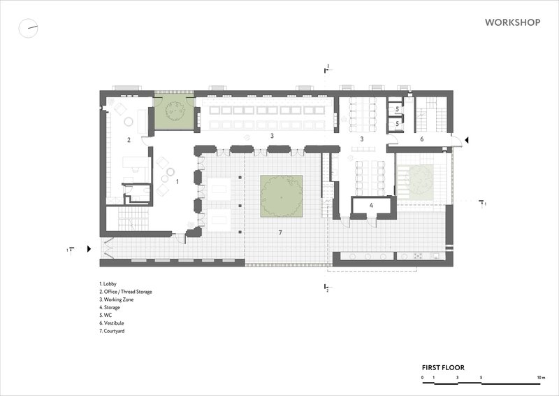 First floor plan showing open working zone with central courtyard and adjacent service spaces