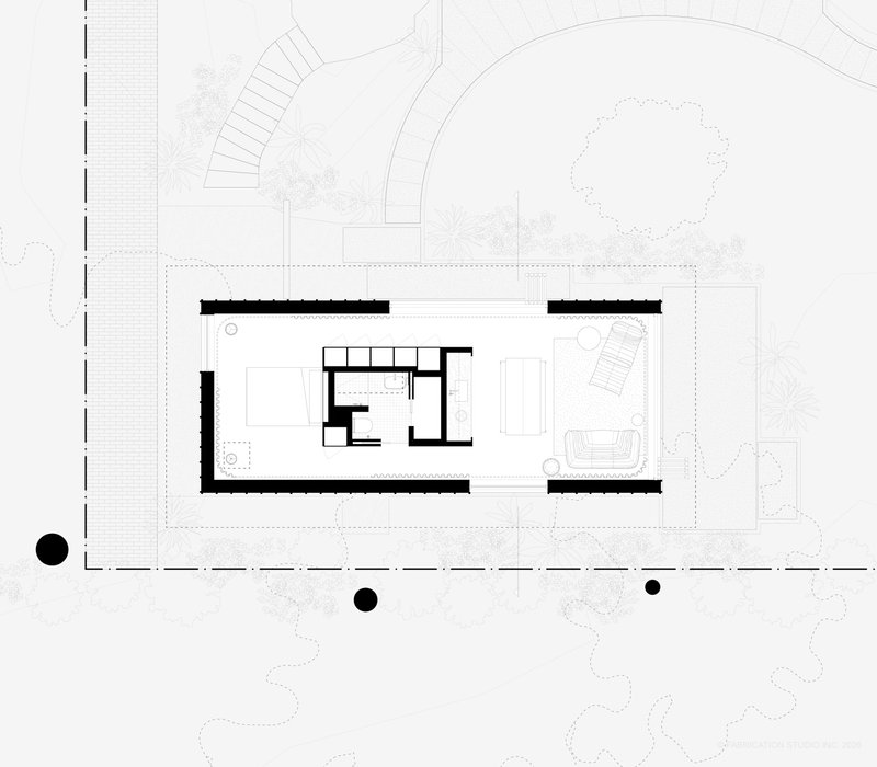 Floor plan drawing showing a rectangular residence with interior core and surrounding landscape