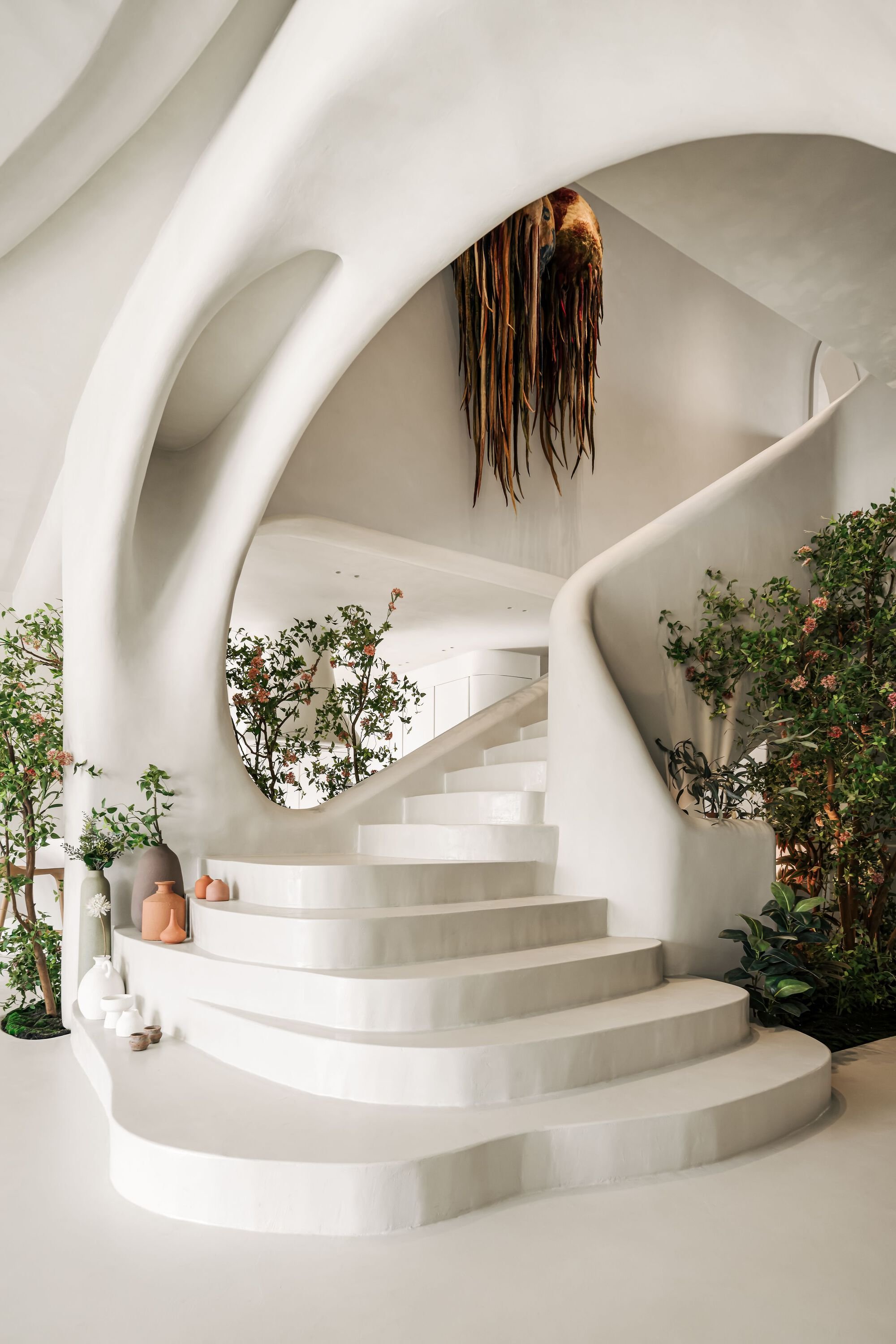 Badie Architects Sculpts a Cairo House Where Walls Flow Like Wind and Trees Grow Through Floors