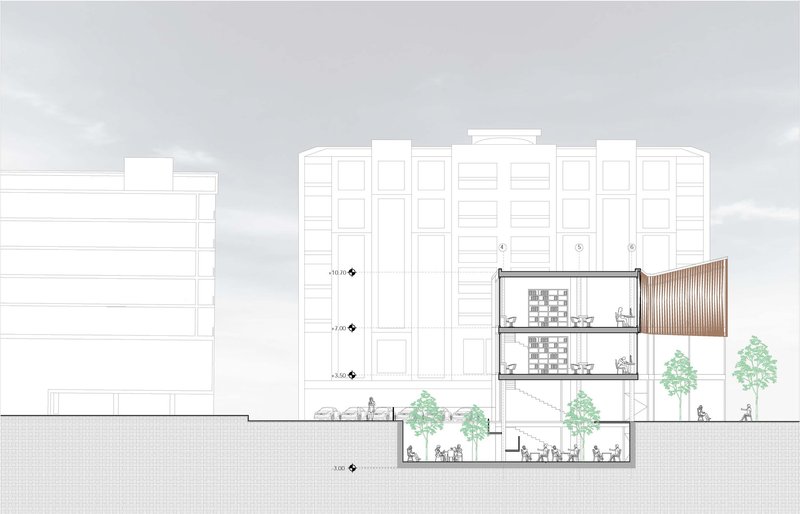 Sectional cut revealing layered library spaces and sunken public courtyard integration