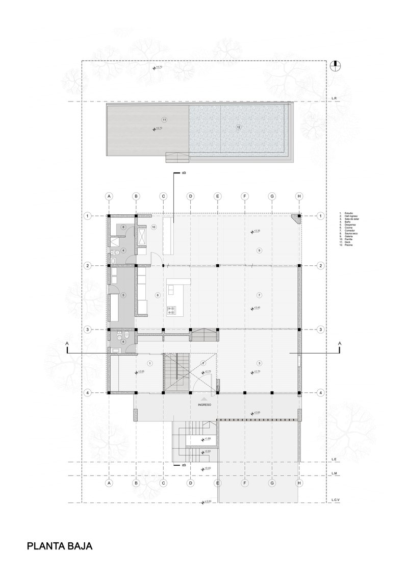 Ground floor plan drawing showing living spaces arranged around central staircase and rear terrace