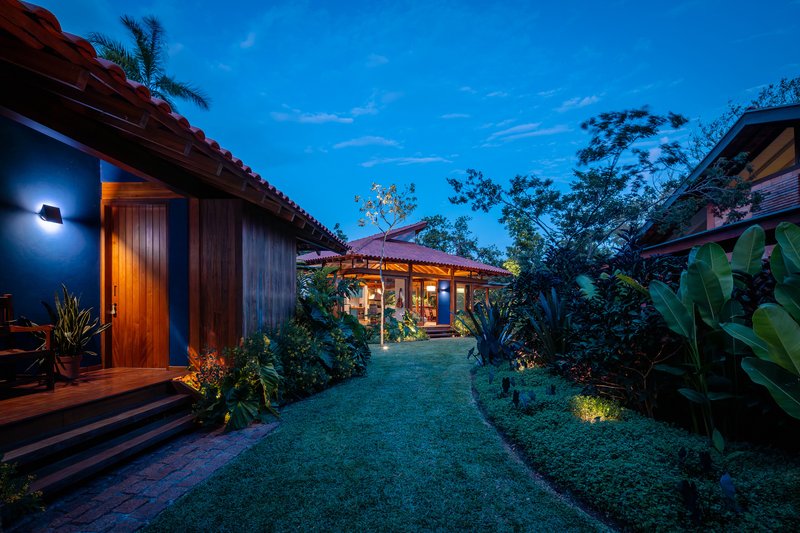 Gil Mello Arquitetura Scatters Timber Pavilions Across a Brazilian Garden in Barão Geraldo House