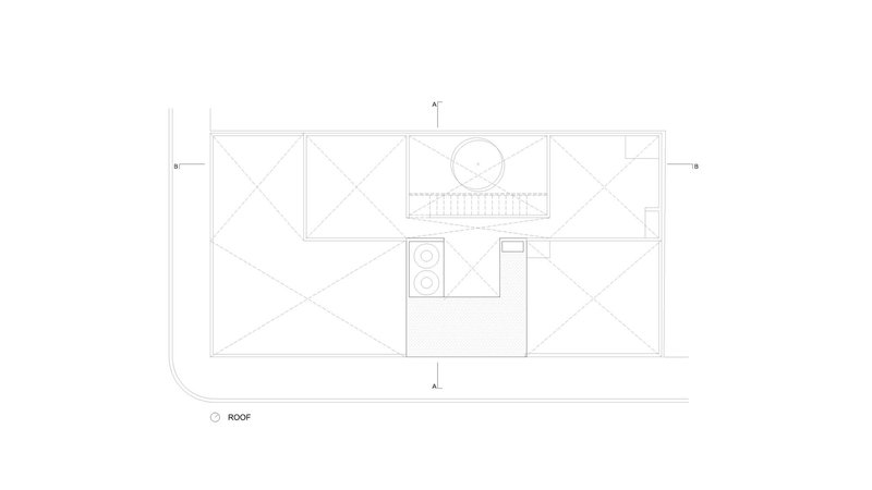 Roof plan drawing showing pitched roof surfaces with diagonal infill and central skylight