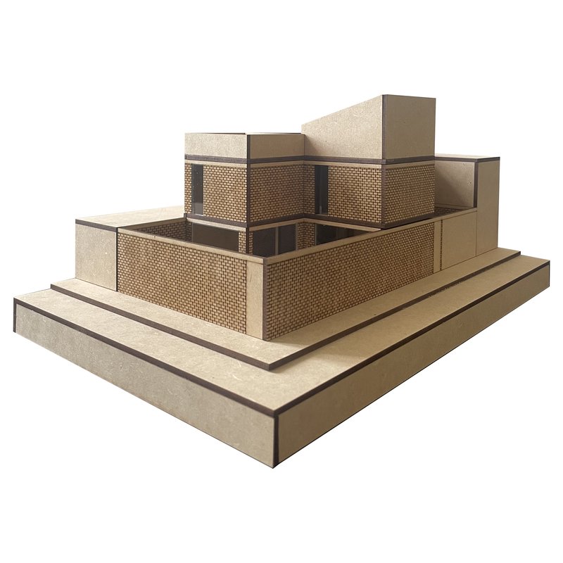 Physical model showing stepped terraces with perforated screen panels and solid volumes on a tiered plinth base