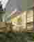 ANMA Wraps a Brick Monolith Around 1,000 Seats and Recycled Oyster Shells in Colombes