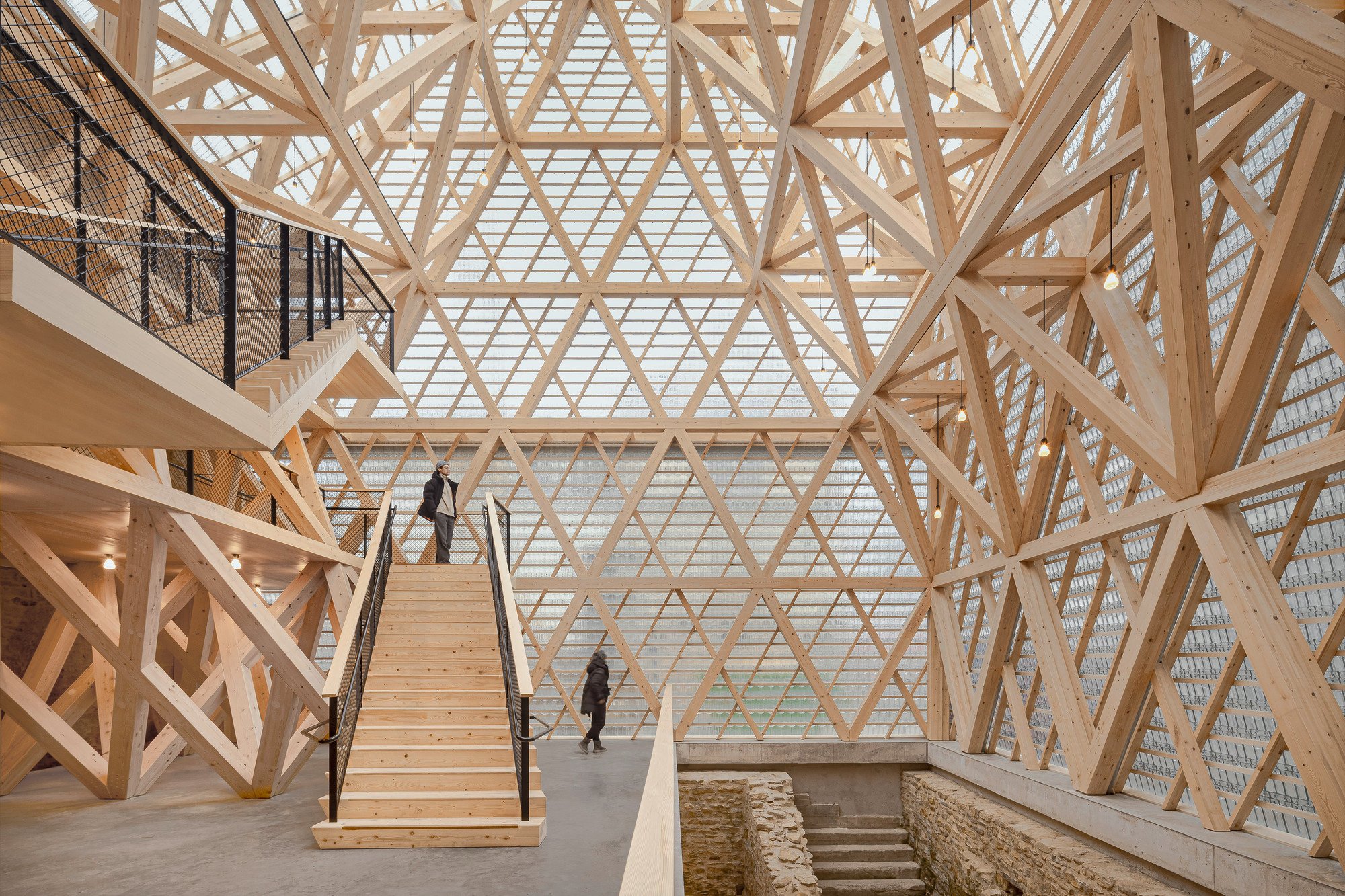 wulf architekten Wraps a Lost Medieval House in Glass and Timber to Make It a Memory