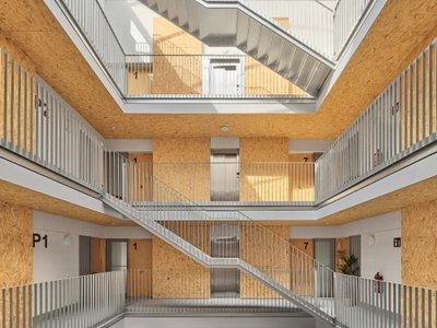 4RQ and MBM Arquitectes Build 24 Social Housing Units That Bridge Industry and Park in Igualada