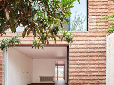 TALLER PONTI Flips a 1990s Row House in Sant Pere de Ribes by Entering Through the Garden
