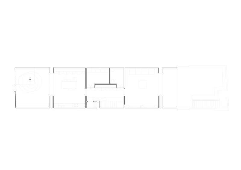 Floor plan drawing showing rectangular layout with rooms arranged along a linear corridor