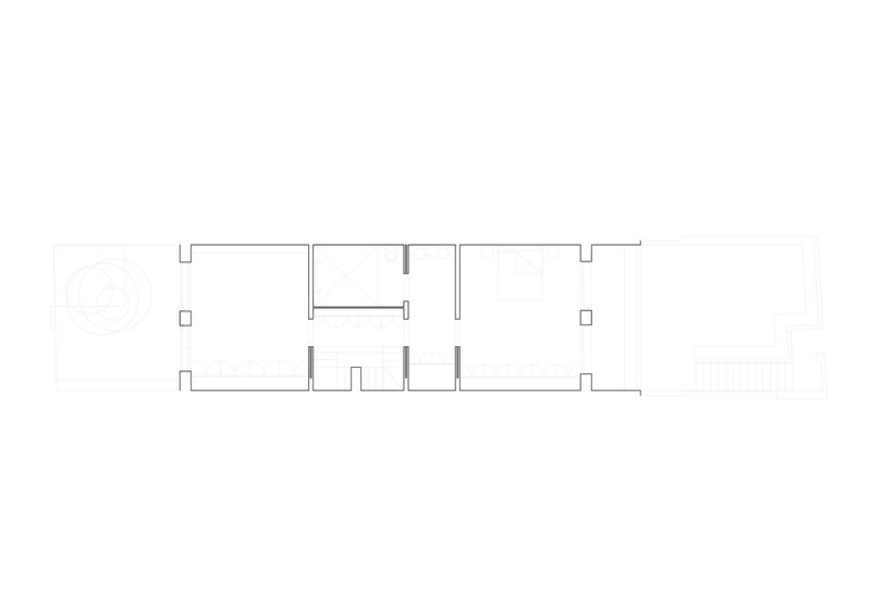 Floor plan drawing showing rectangular layout with rooms and central circulation zones