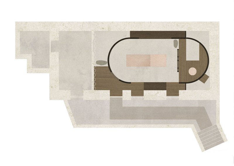 Floor plan drawing with an oval central space flanked by rectangular volumes and exterior stair
