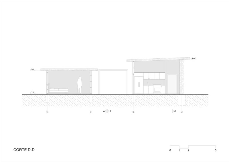 Section drawing illustrating split-level volumes with lower bedroom wing and elevated living area