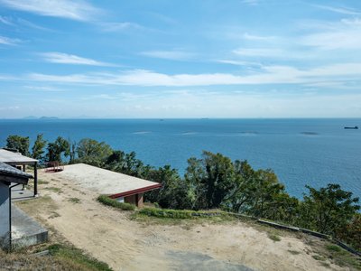Jo Nagasaka Burrows Guest Quarters and a Bar into a Seto Inland Sea Hillside