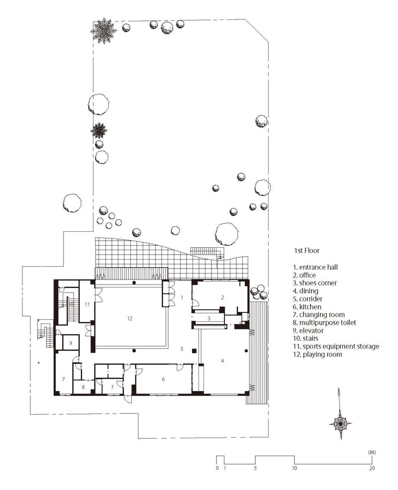 First floor plan drawing showing entrance hall, offices, dining areas and outdoor courtyard with trees
