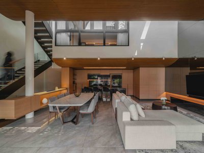 RCAB Studio Stacks Five Levels of Domestic Life Behind a Timber Screen in Jakarta