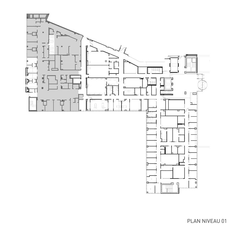 Floor plan drawing showing angular geometry with triangular wing meeting rectangular bar of residential units