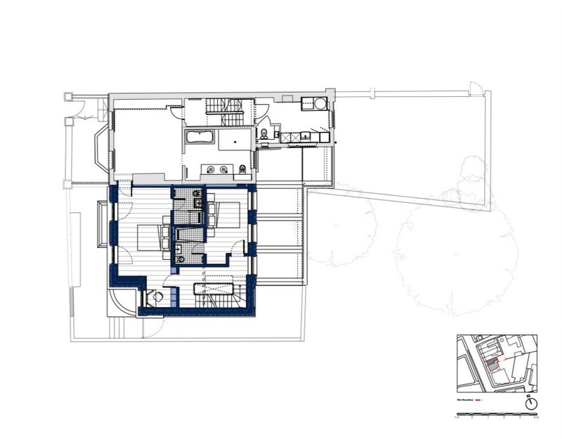 Floor plan drawing showing bedroom level with central stair core and balcony to the east