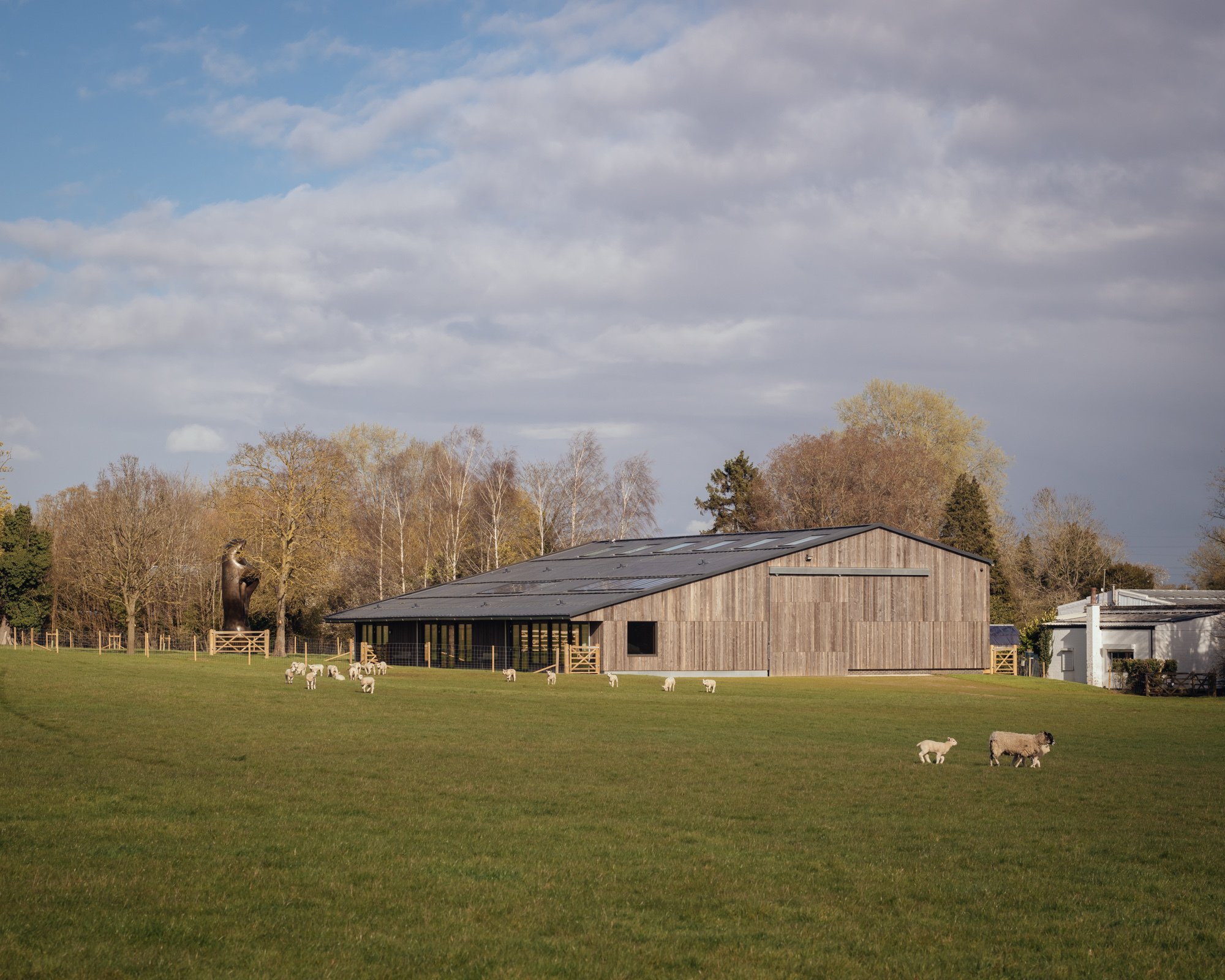 DSDHA Wraps a Henry Moore Barn in Reclaimed Timber to Create a Learning Center in Hertfordshire