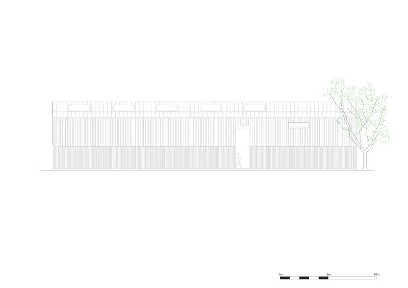 Elevation drawing of the long facade with clerestory windows and a figure near a tree
