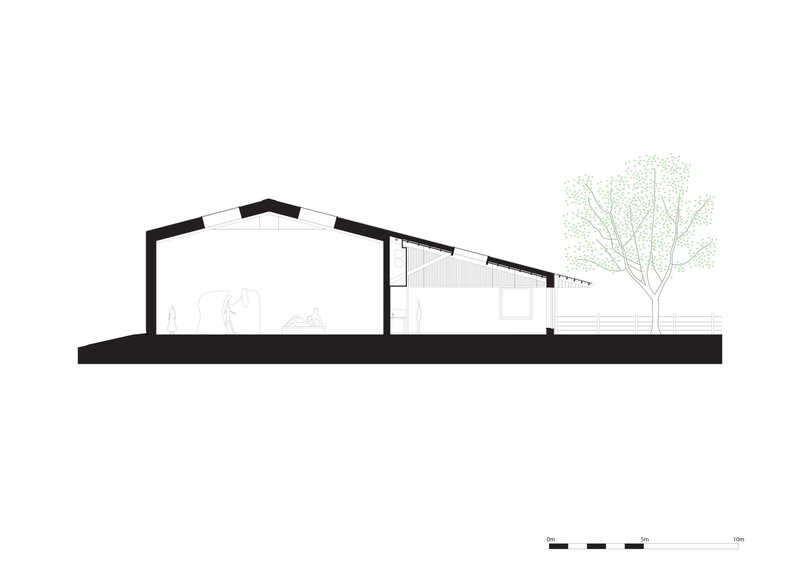 Section drawing showing the pitched roof structure and interior volumes with a tree outside