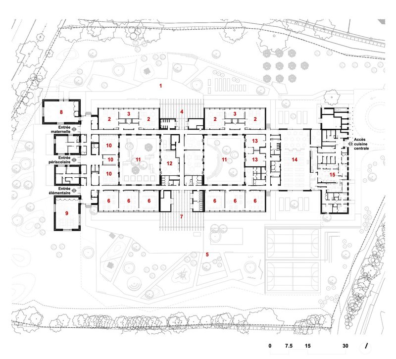 Floor plan drawing showing the linear arrangement of classrooms around central courtyards and circulation spine